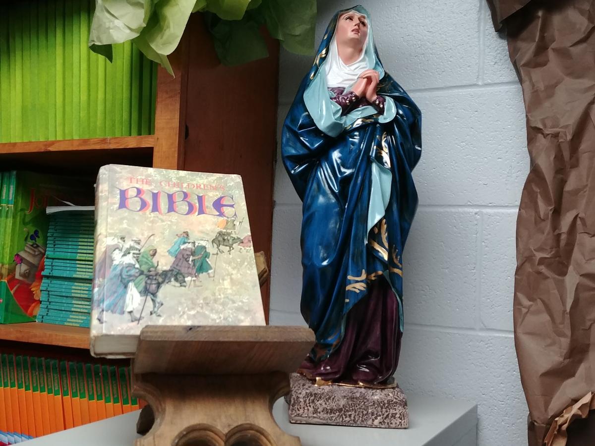 Classroom Altar with statue of Our Lady of Sorrows